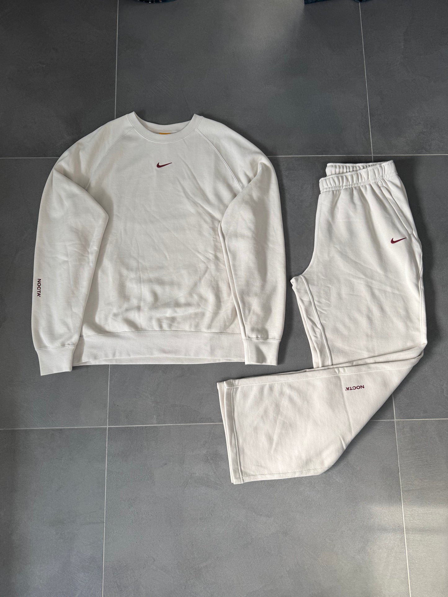 nike nocta tuta completa beige