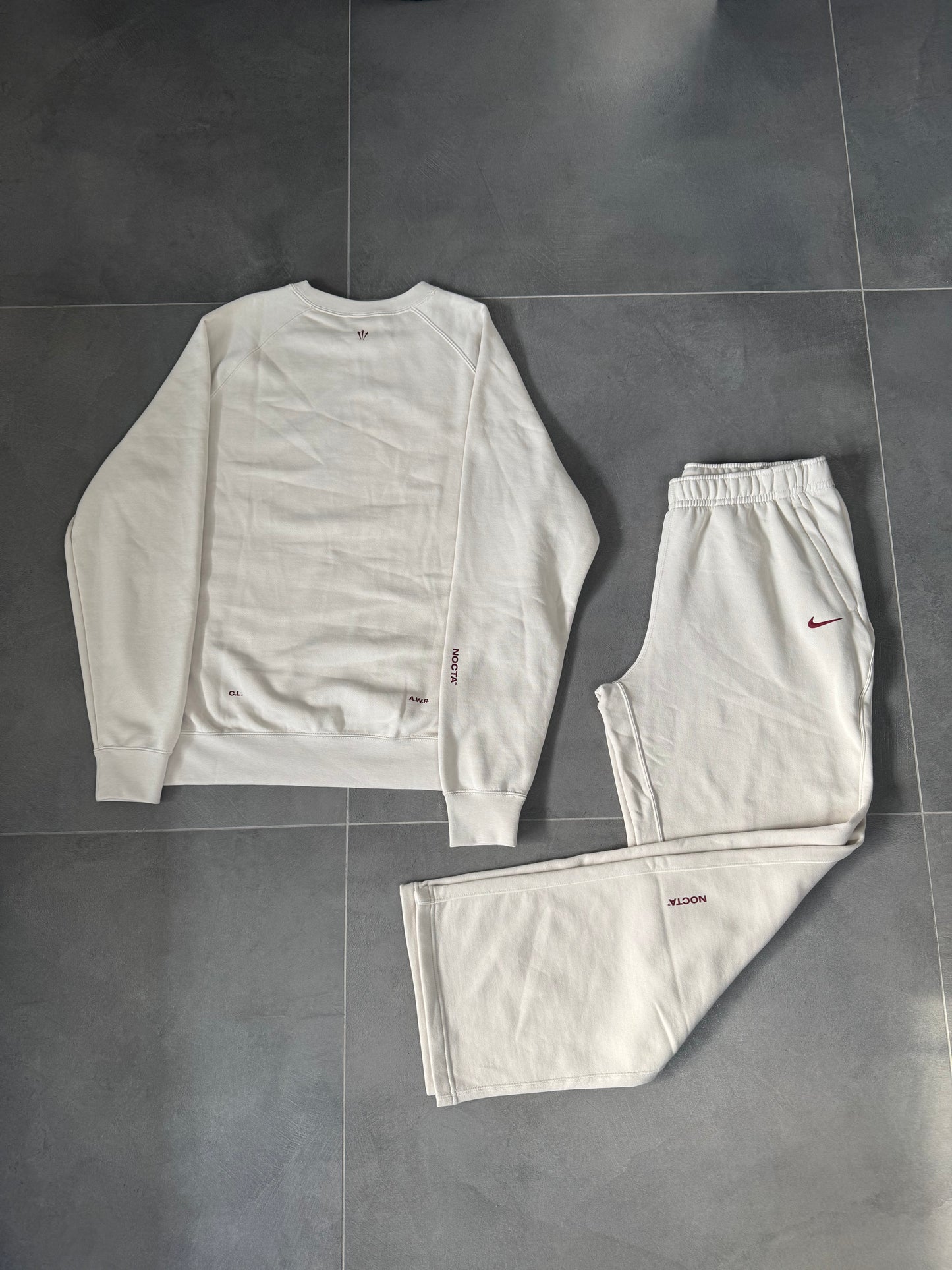 nike nocta tuta completa beige