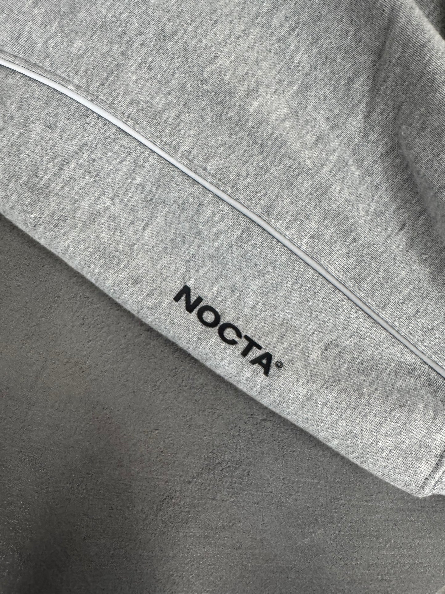 nike nocta tuta completa grigia