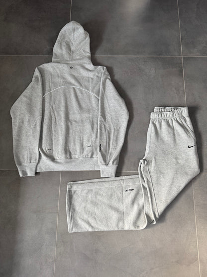 Nike Nocta Tuta Completa Grigia